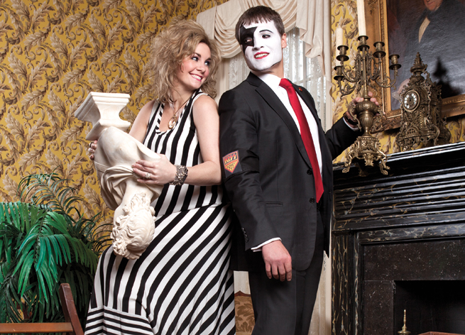 Natalie and Win Rockefeller Jr. cut up at Trapnall Hall. Natalie wears a dress and accessories from Barbara/Jean Ltd. Win’s suit is from Baumans.